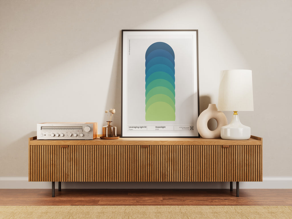 Wooden console table with decorative items and a framed abstract art piece in a room.