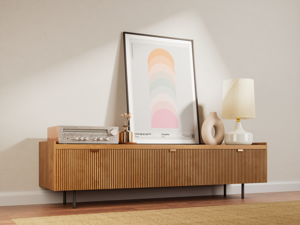 Wooden sideboard with decorative items against a beige wall